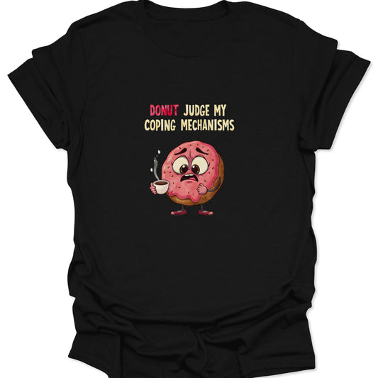Graphic t-shirt on a black background featuring a nervous pink-frosted donut holding a steaming coffee cup with the text "Donut Judge My Coping Mechanisms."
