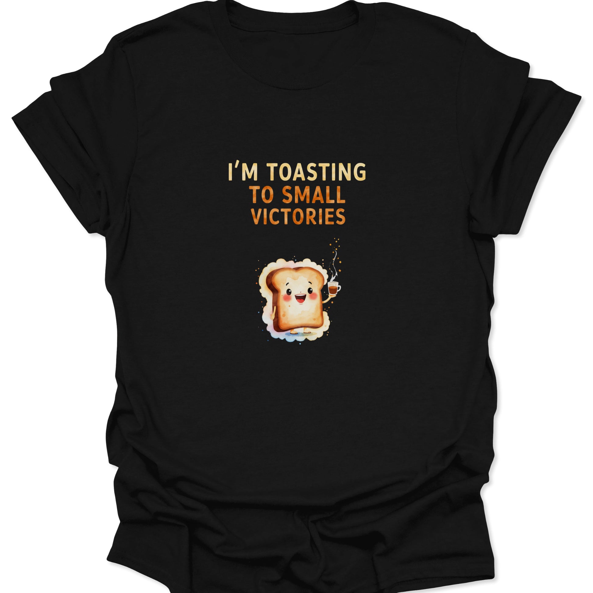 Black t-shirt featuring cute toast character raising a coffee cup with "Toasting To Small Victories" text.