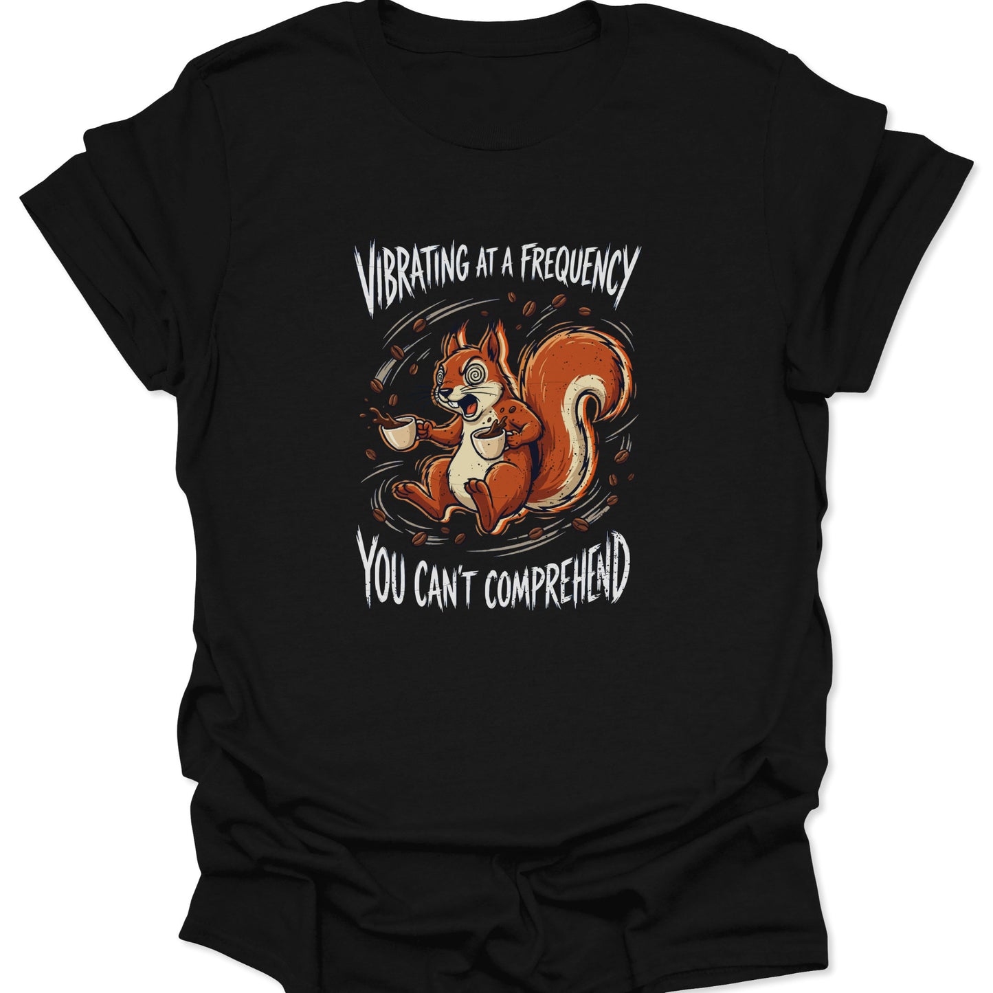 Graphic tee featuring a brown squirrel with spiral eyes holding two coffee mugs with the text "Vibrating at a Frequency You Can't Comprehend" in white distressed font on a black background.