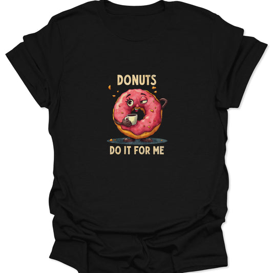 Close-up of black t-shirt featuring a funny, tired-looking pink-glazed donut character drinking coffee with the text 'DONUTS DO IT FOR ME'.