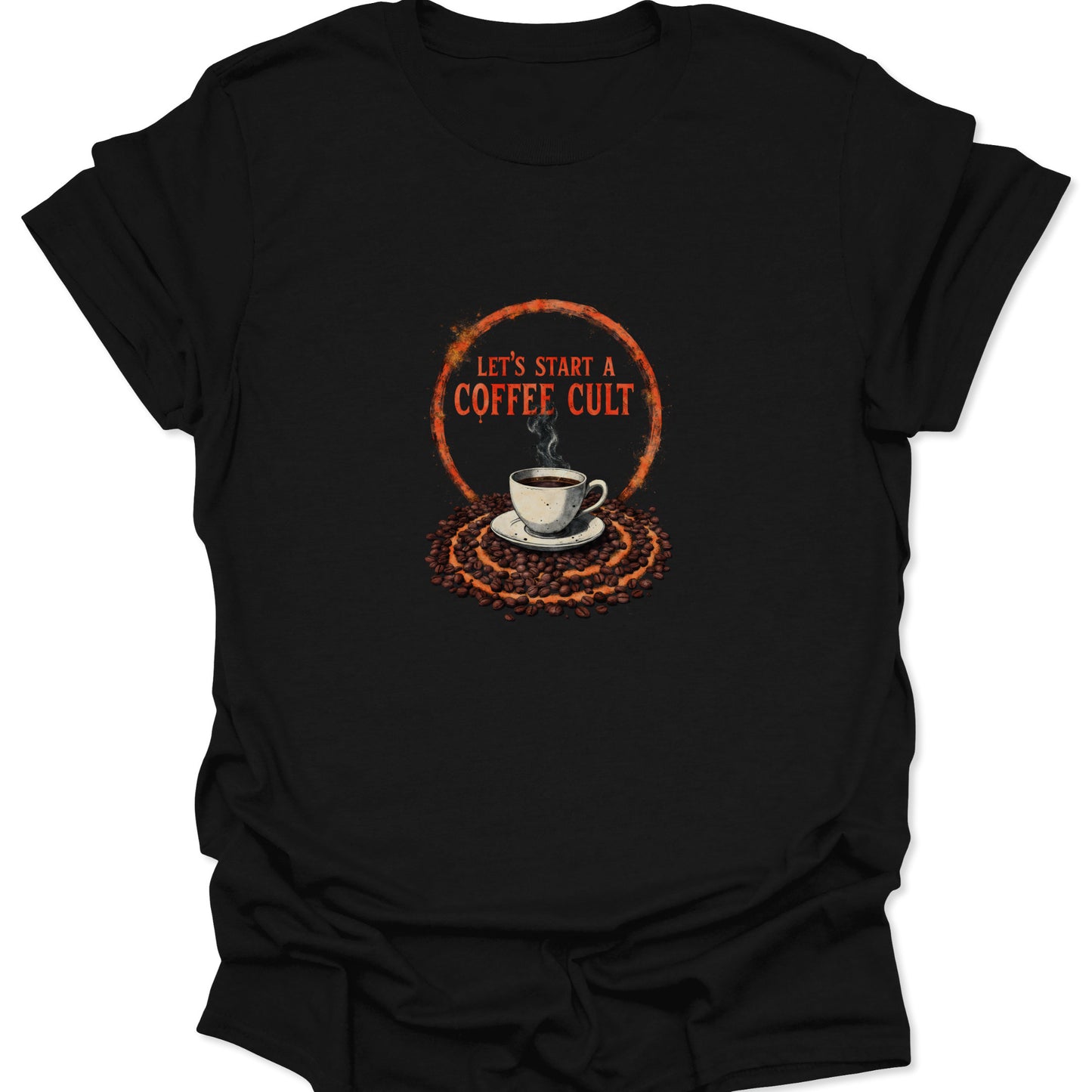 Close-up of a black graphic tee featuring a coffee cup, beans, and the fiery orange text 'LET'S START A COFFEE CULT' within a circular border.