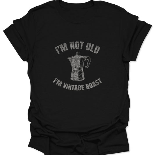 A black graphic tee featuring a distressed white Moka pot illustration and the text "I'm Not Old, I'm Vintage Roast."