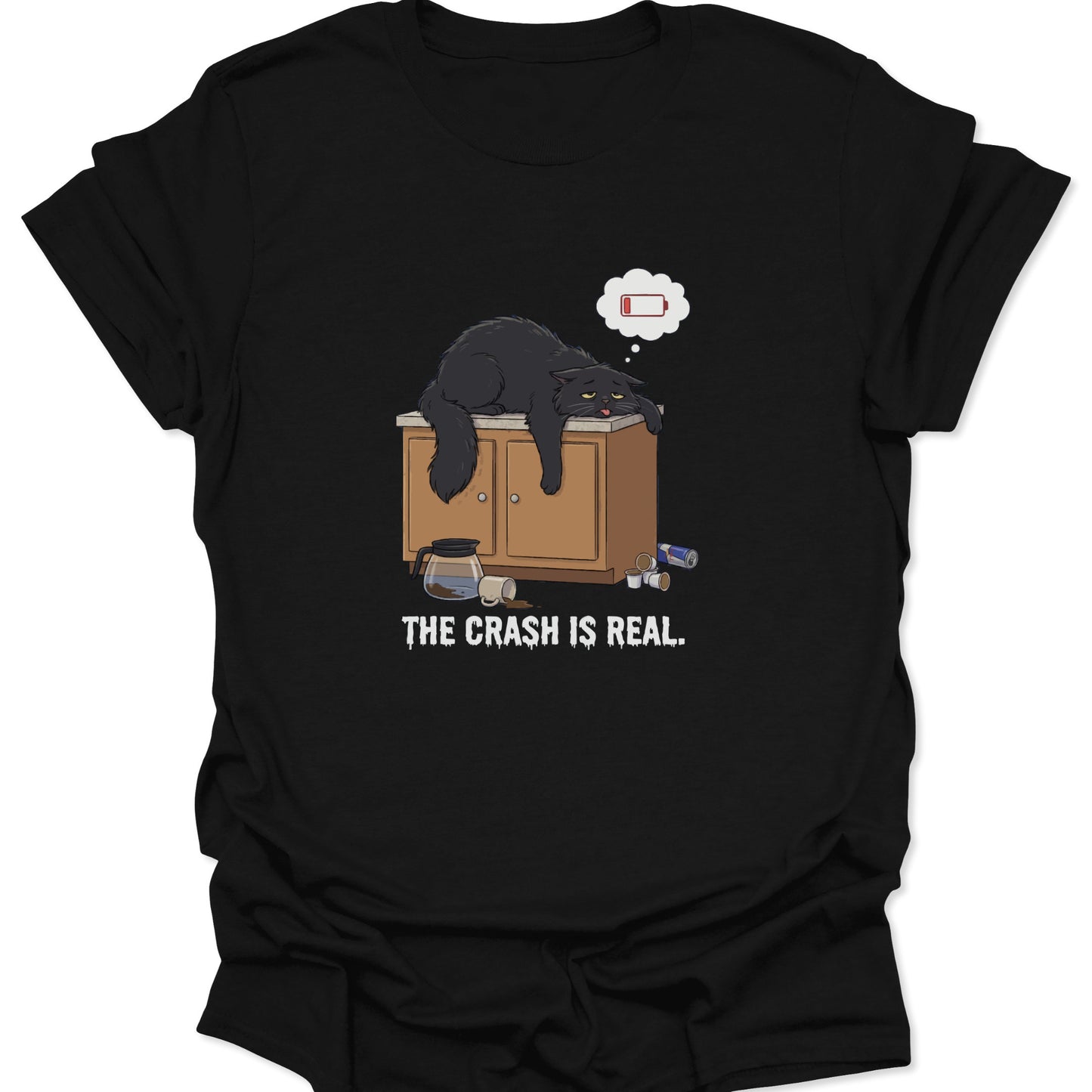 Graphic tee on black fabric showing a tired black cat slumped over a counter with a low battery thought bubble.