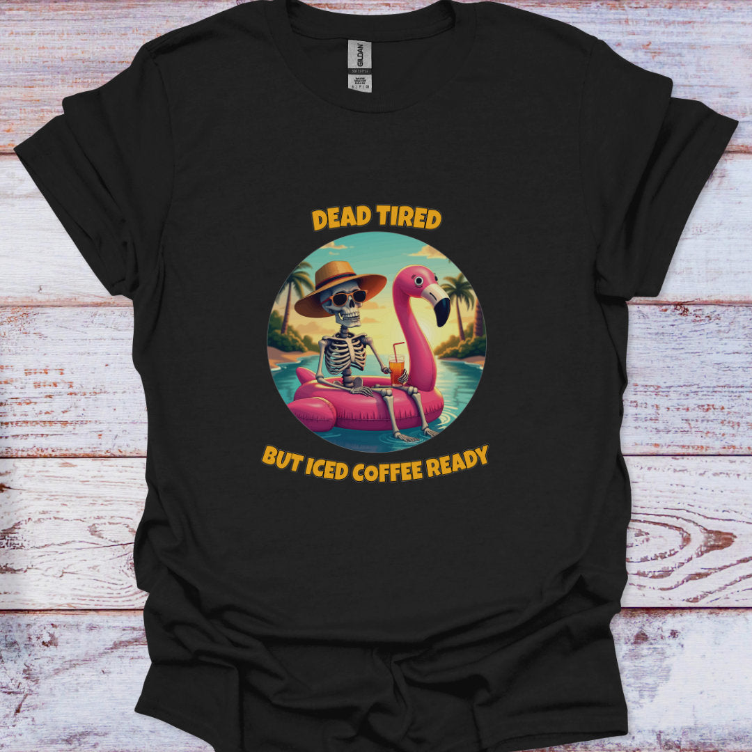 Black t-shirt with a skeleton and flamingo graphic on a wooden surface