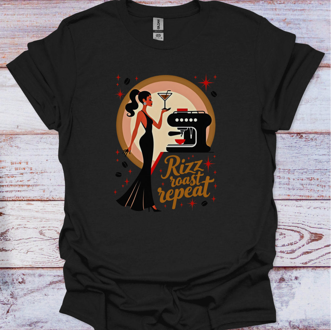 Black t-shirt with a graphic design of a woman, coffee machine, and text 'Rizz roast repeat' on a wooden surface.