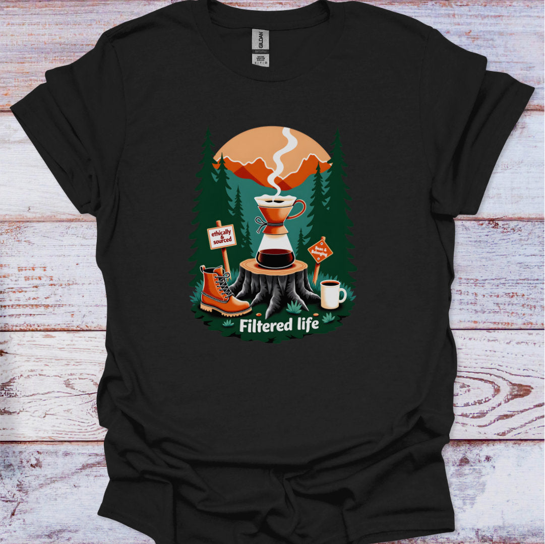 Black t-shirt with a coffee-themed graphic on a wooden surface
