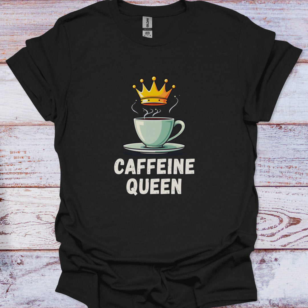Black t-shirt with a coffee cup and crown graphic and 'CAFFEINE QUEEN' text on a wooden surface.