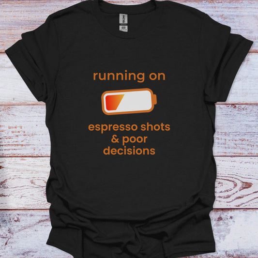Black t-shirt with orange text and battery graphic on a wooden surface