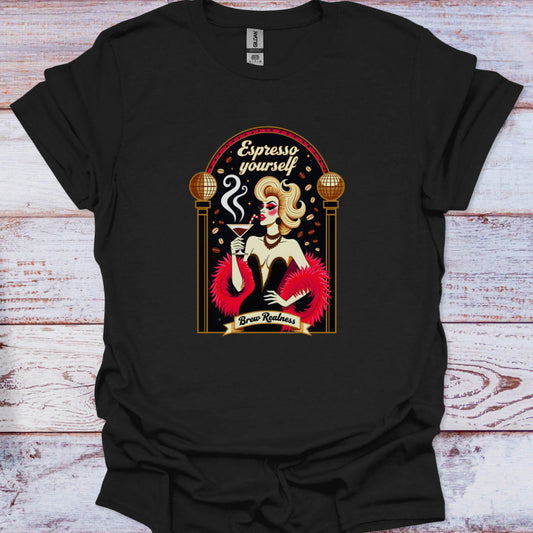 Black t-shirt with a graphic design of a woman holding a coffee cup and text 'Espresso yourself Brew Realness' on a wooden surface.