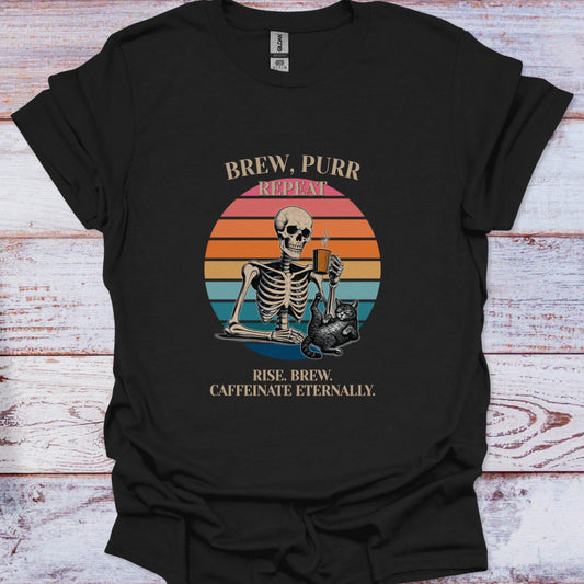 Black t-shirt with a skeleton and cat design and text on a wooden surface