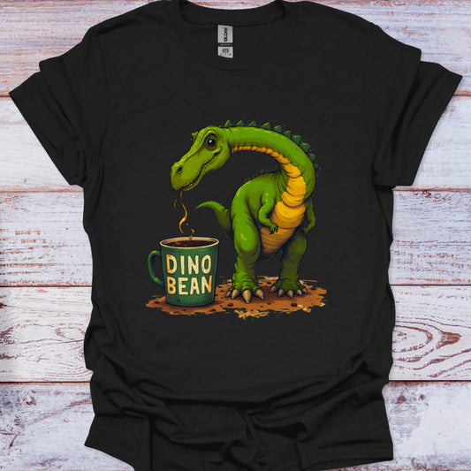 Black t-shirt with a green dinosaur and 'Dino Bean' coffee cup design on a wooden surface.