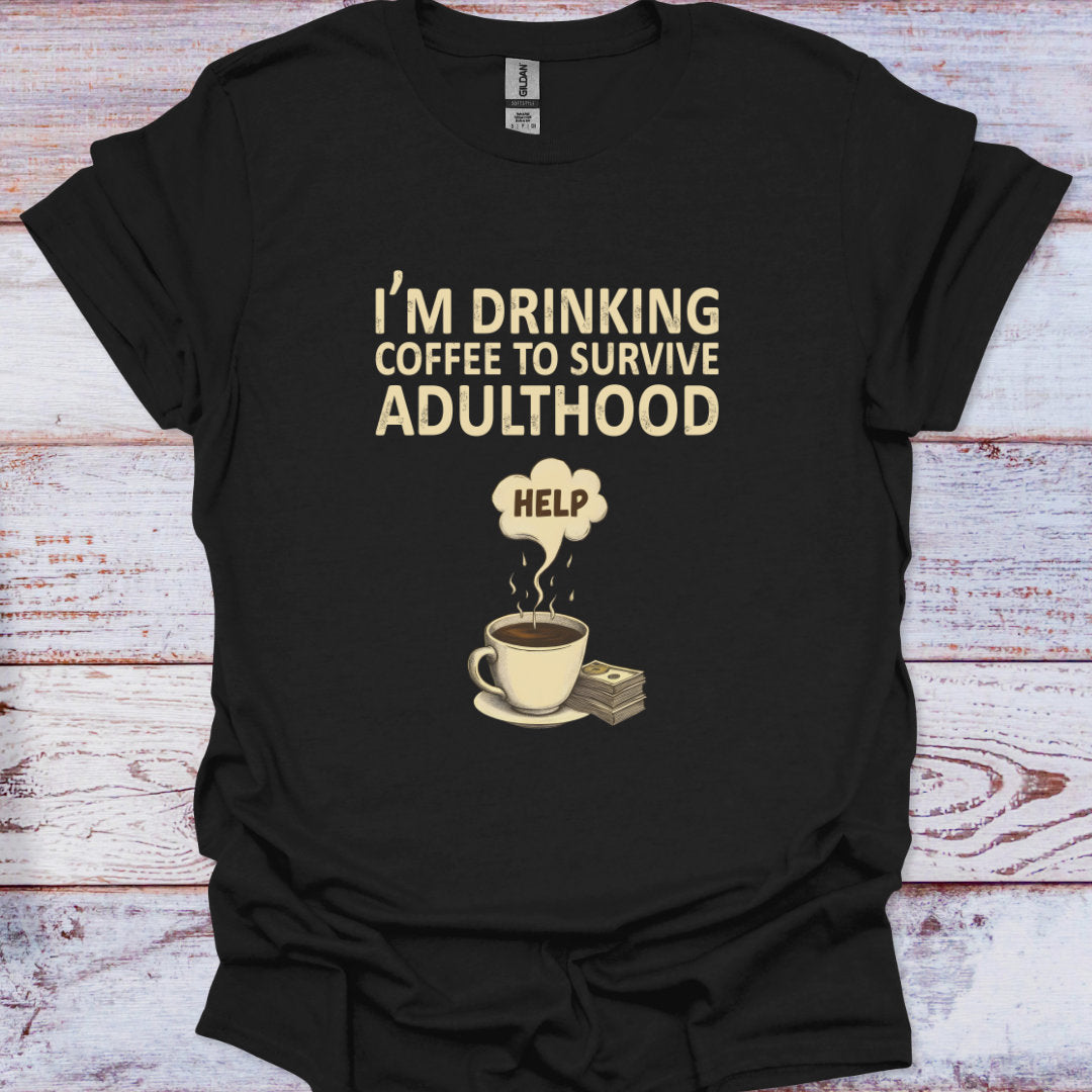 Black t-shirt with humorous coffee-themed text and graphic on a wooden surface