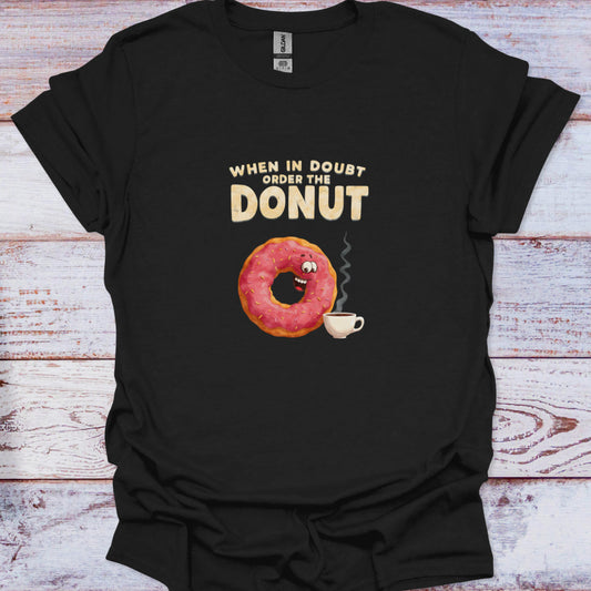 Funny pink frosted donut character and steaming coffee cup graphic printed on a black t-shirt.