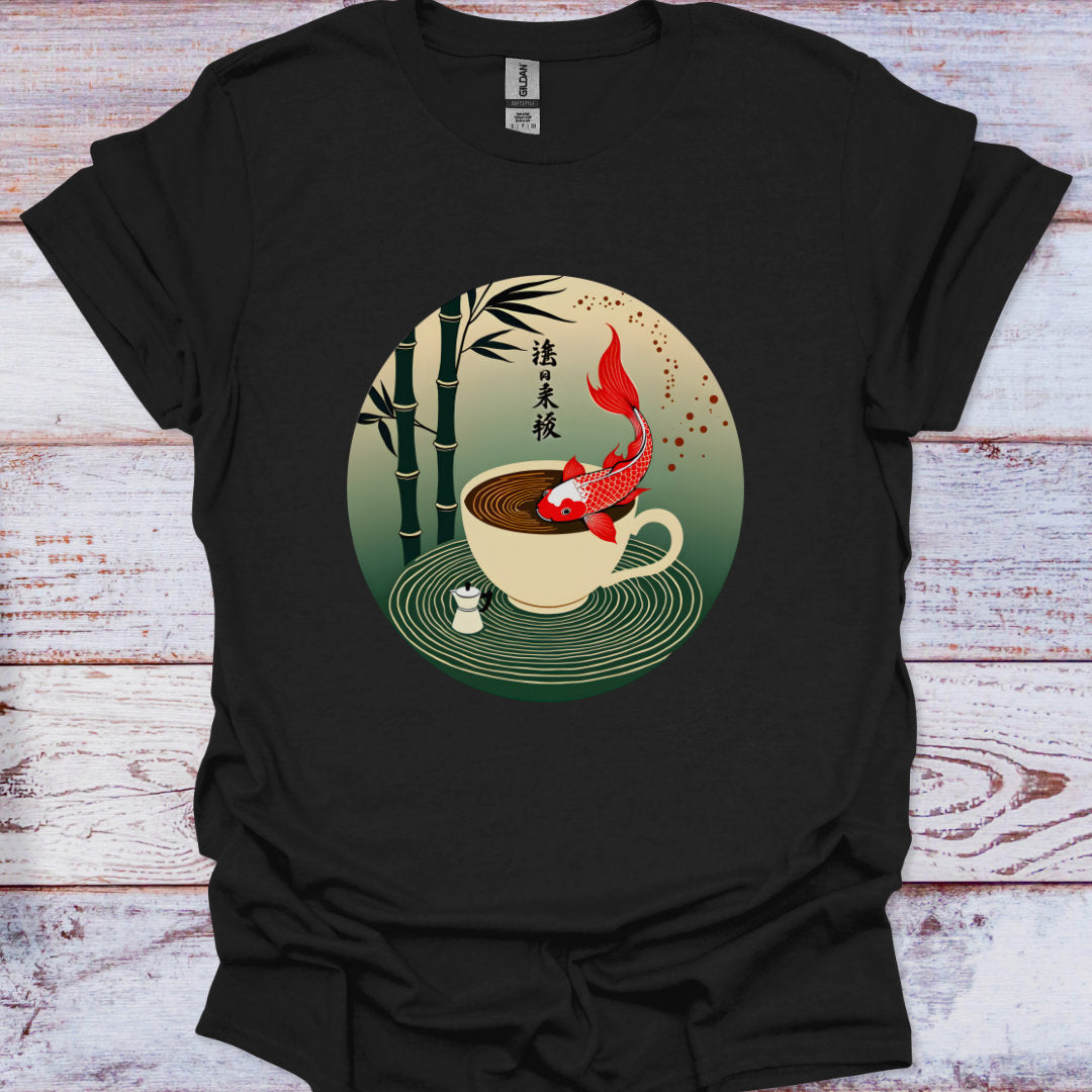 Black t-shirt with a graphic of a teacup with a fish and bamboo on a wooden surface