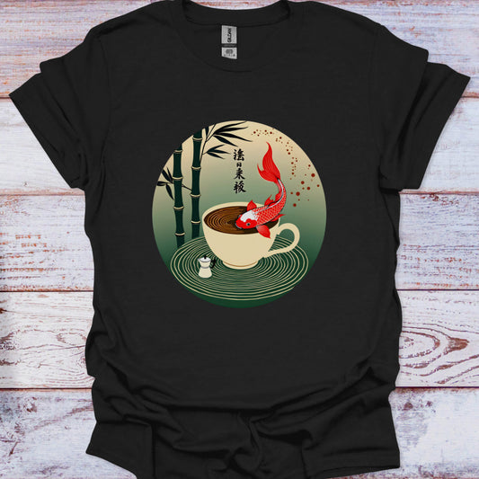 Black t-shirt with a graphic of a teacup with a fish and bamboo on a wooden surface