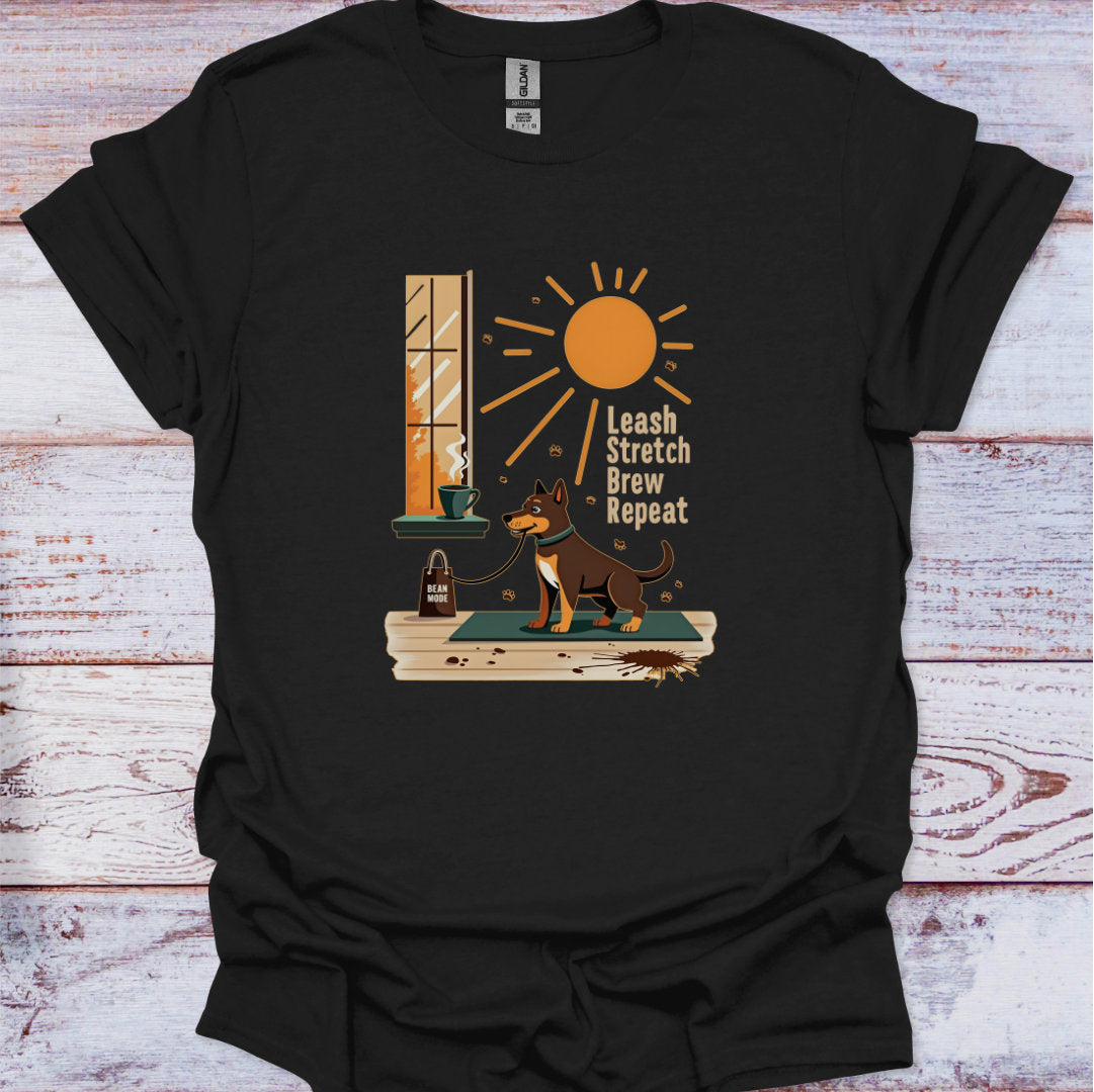Black t-shirt with a dog graphic and text on a wooden surface