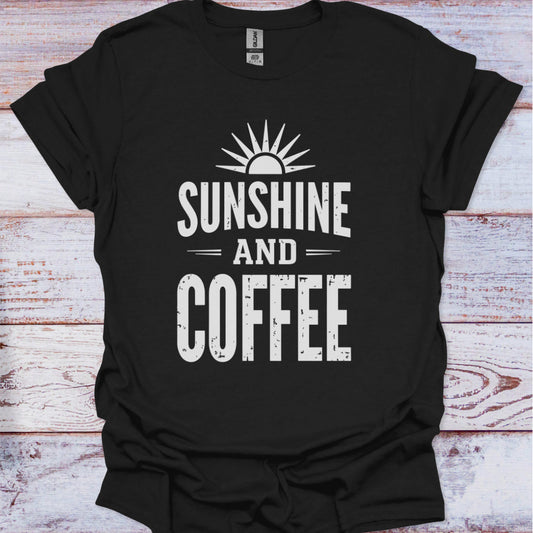 Black t-shirt with 'Sunshine and Coffee' text on a wooden surface