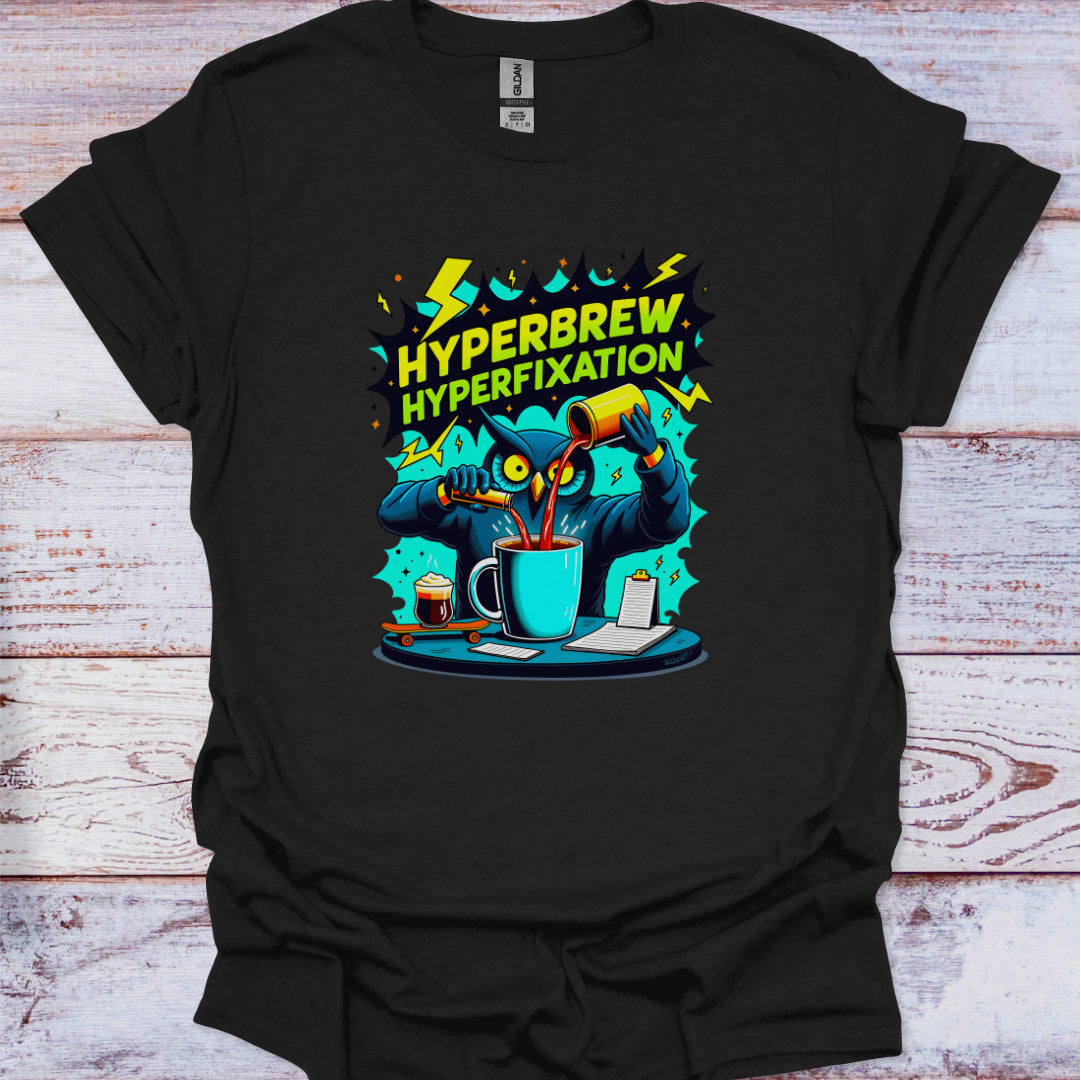 Black t-shirt with colorful graphic design on a wooden surface