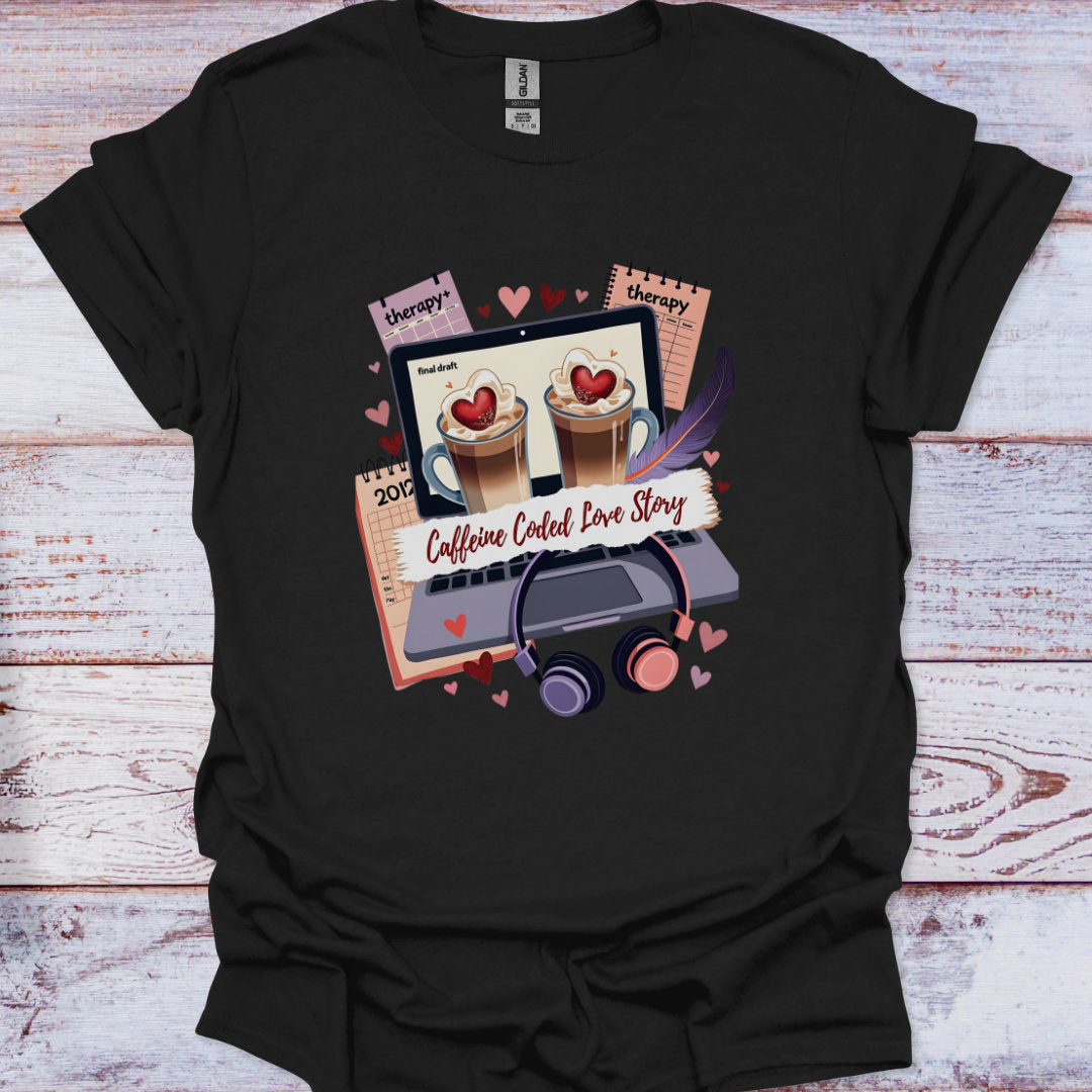 Black t-shirt with a graphic design of coffee cups, a laptop, and text on a wooden surface