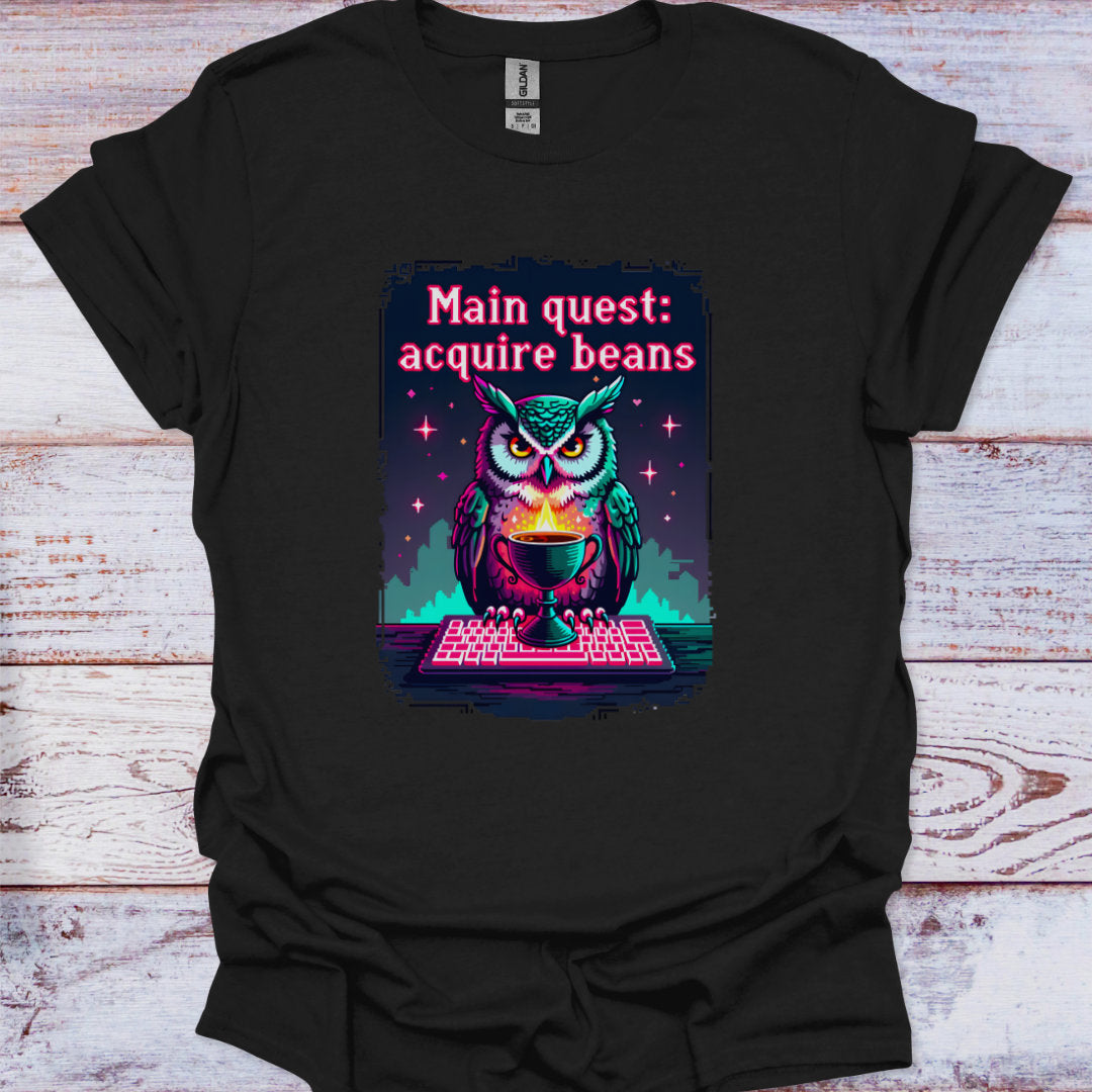 Black t-shirt with an owl graphic and text on a wooden surface