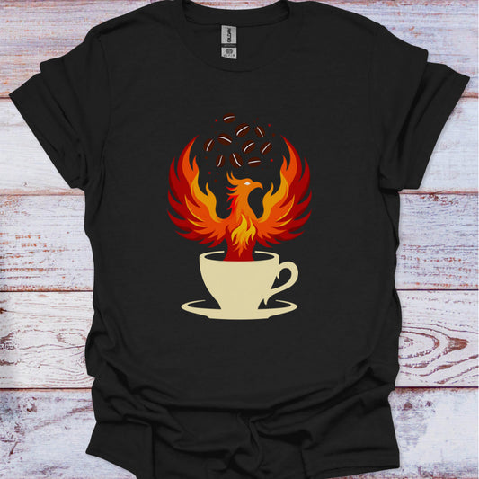 Black t-shirt with a graphic of a phoenix rising from a coffee cup on a wooden surface