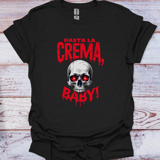 Black t-shirt with a skull graphic and red text on a wooden surface