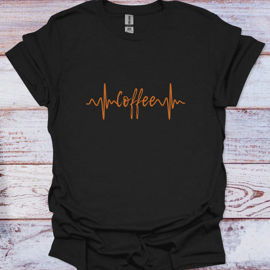 Black t-shirt with orange 'coffee' text on a wooden surface