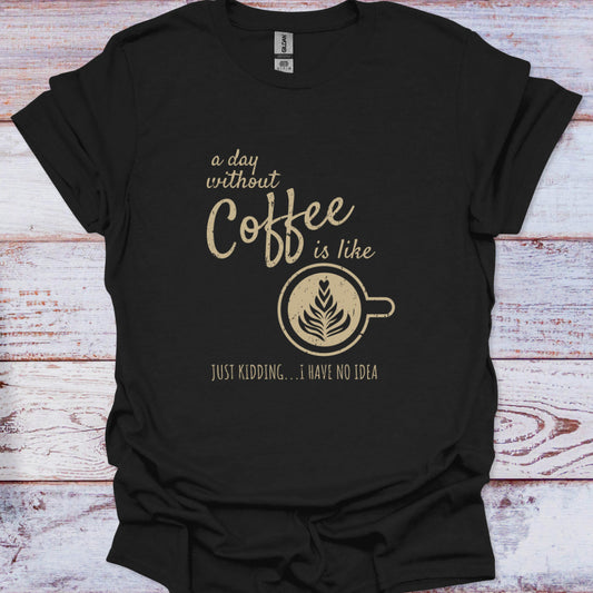 Black t-shirt with gold coffee-themed text and graphic on a wooden surface