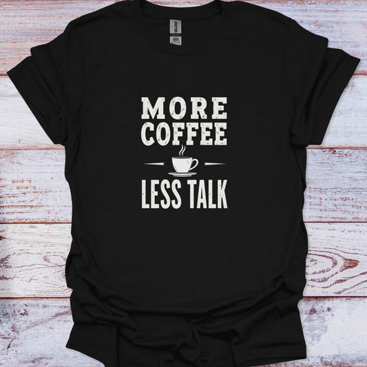 High contrast black graphic tee with a white text slogan "MORE COFFEE LESS TALK" and minimalist coffee cup icon.