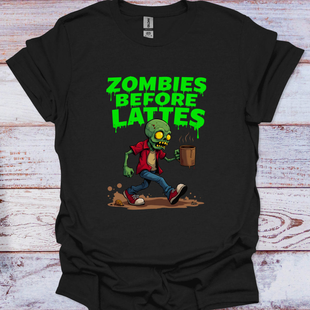 Black t-shirt with a zombie graphic and 'Zombies Before Lattes' text on a wooden surface