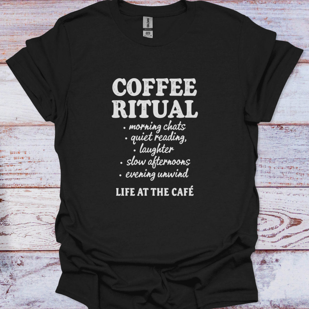 Black t-shirt with white text 'Coffee Ritual' on a wooden surface