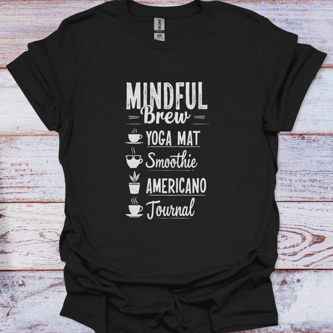 Black t-shirt with white text on a wooden surface