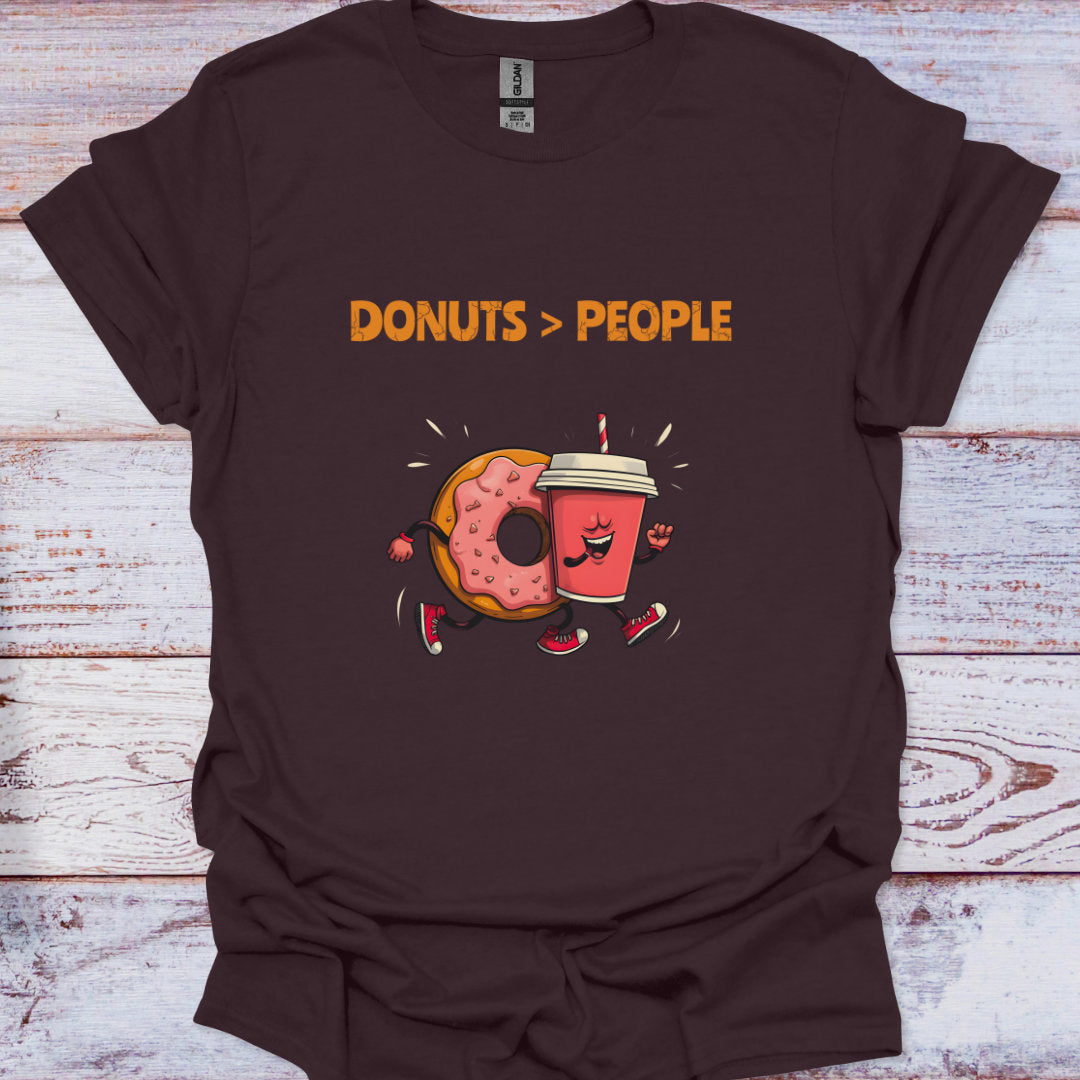 Brown t-shirt with 'Donuts > People' graphic design on a wooden surface
