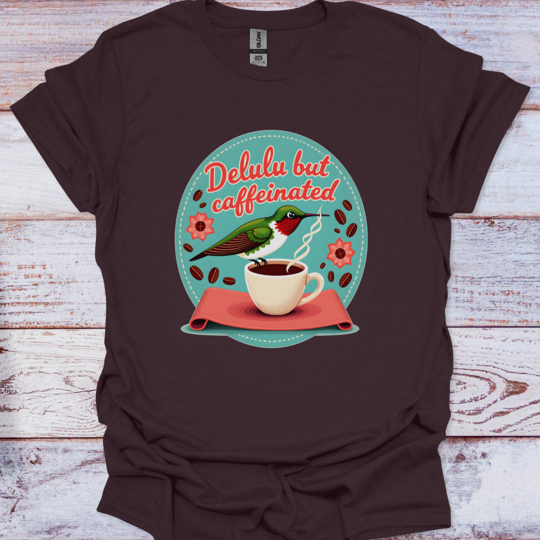 Brown t-shirt with a coffee-themed graphic and text on a wooden surface