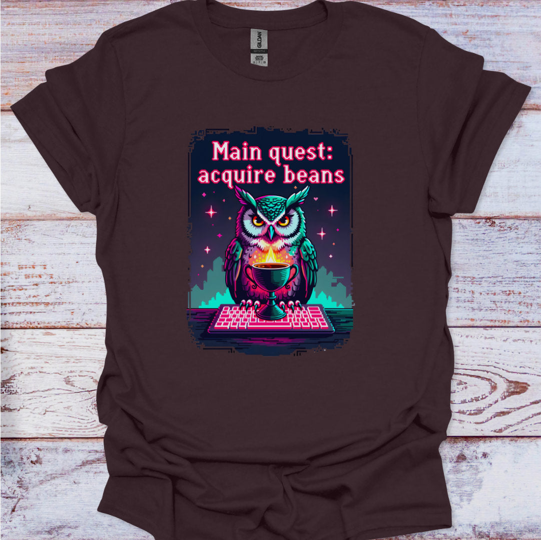 Brown t-shirt with an owl graphic and text on a wooden surface