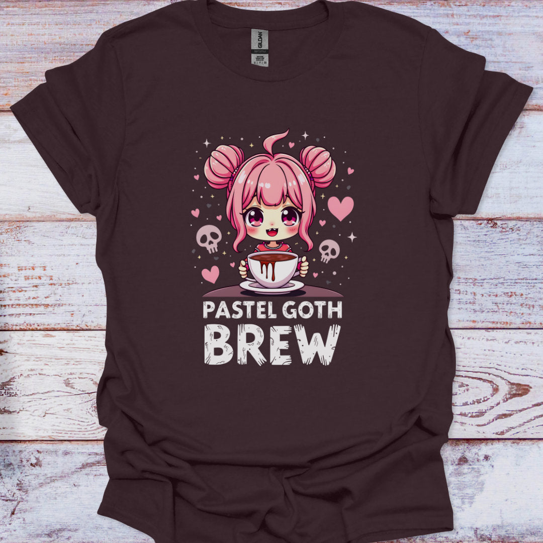 Brown t-shirt with a pastel goth design featuring a character with pink hair and a cup of coffee on a wooden surface.