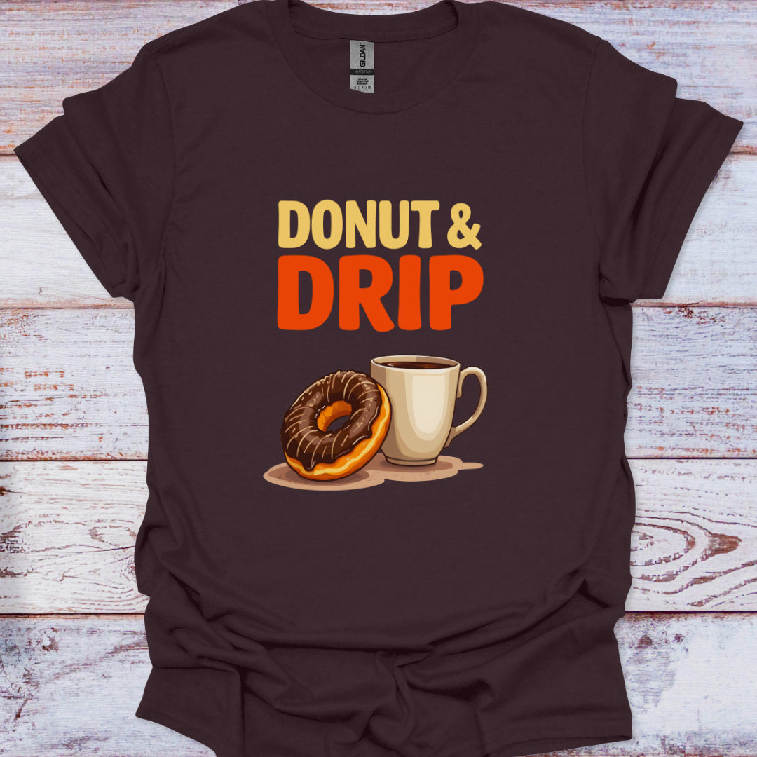 Brown t-shirt with 'Donut & Drip' graphic on a wooden surface