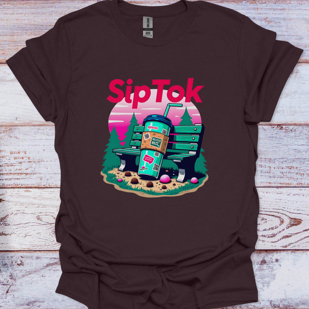Brown t-shirt with 'Sip Tok' graphic design on a wooden surface