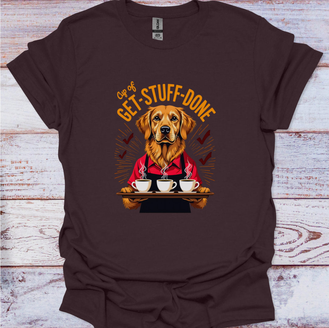 Brown t-shirt with a graphic of a dog holding coffee cups and text 'Cup of Get Stuff Done' on a wooden surface.