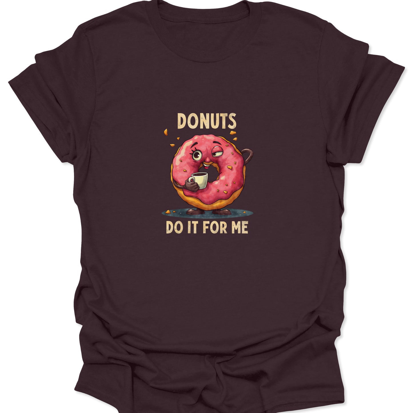 Dark brown t-shirt with a high-detail graphic of an anthropomorphic pink donut holding a white coffee cup, expressing relatable exhaustion.