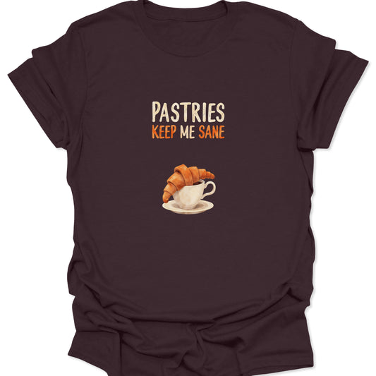 Vintage style bakery graphic with croissant and coffee cup on a dark chocolate brown t-shirt.