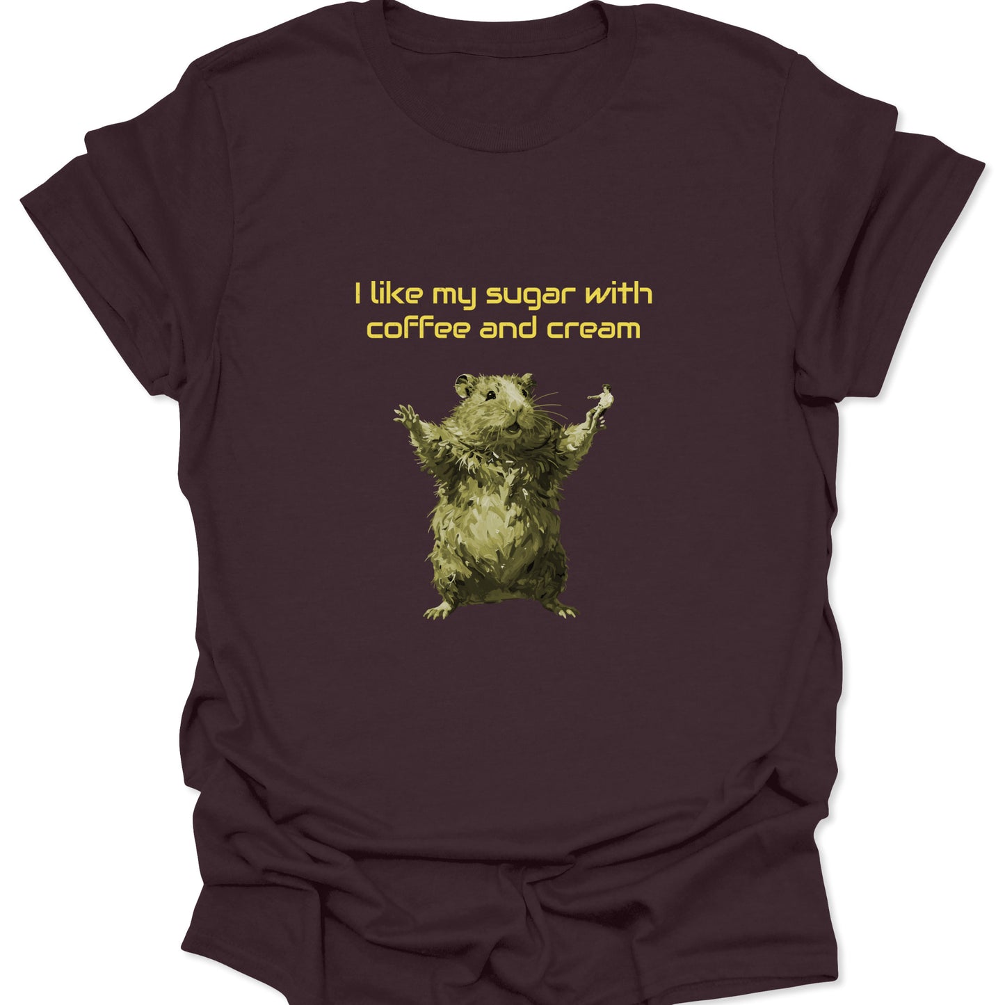 A dark chocolate brown graphic t-shirt featuring a stylized yellow-green hamster with its arms raised and the text "I like my sugar with coffee and cream" in yellow font.