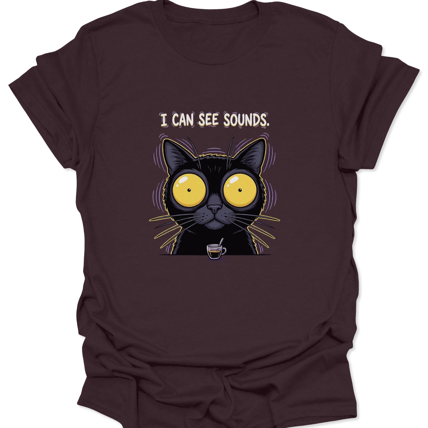 A dark chocolate brown shirt featuring a frantic black cat illustration with large glowing yellow eyes and vibrating purple aura lines, centered around a coffee theme.