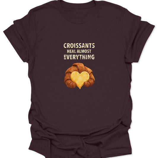 Dark Chocolate Brown tee with a pastry themed design showing a flaky croissant and a melting heart made of butter.