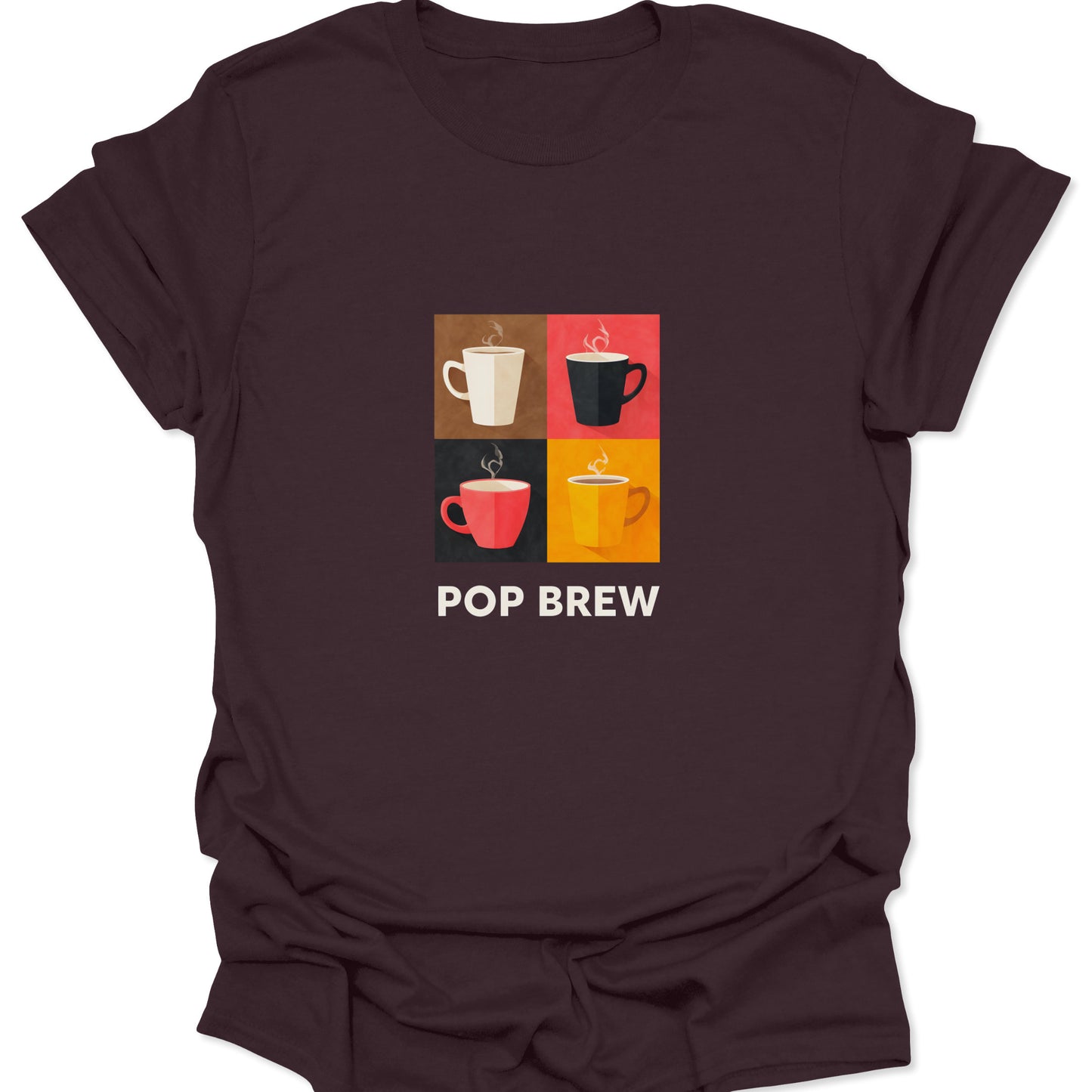 Dark chocolate brown t-shirt featuring a highly-saturated, four-panel graphic of steaming coffee cups, inspired by Warhol's Pop Art, centered above the text "POP BREW."