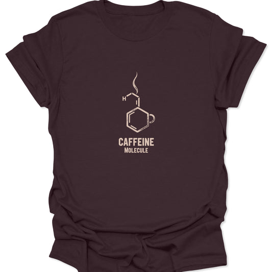 Scientific coffee graphic tee featuring the caffeine molecule's structure and a steaming mug icon in light beige print on a deep, rich dark chocolate brown fabric.