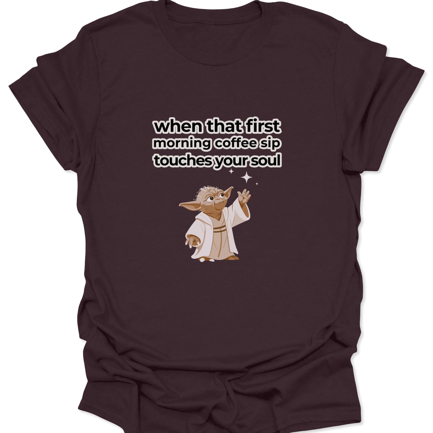 A dark chocolate brown t-shirt showing a Zen-like Yoda character below white text describing the spiritual experience of a first morning coffee sip.