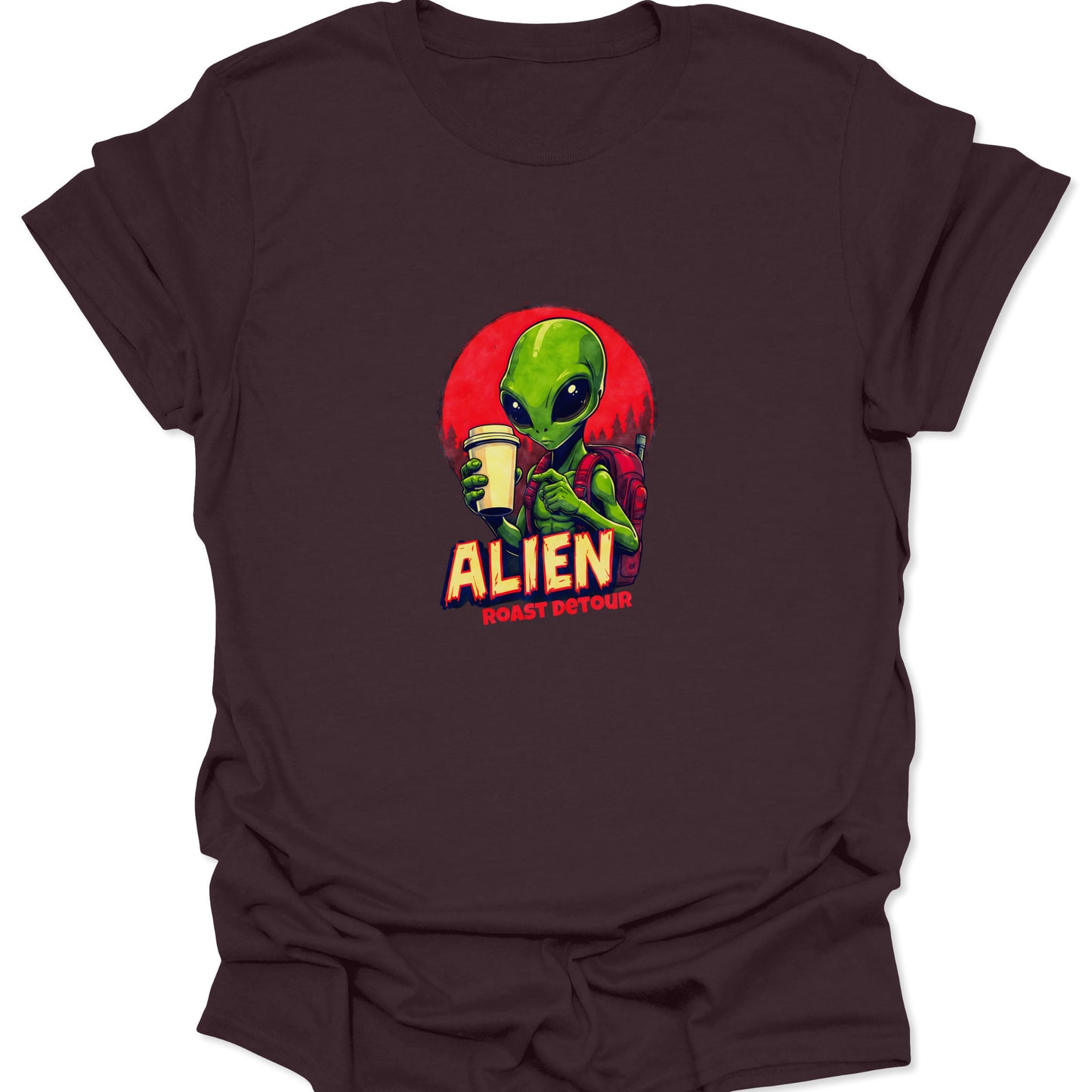 Dark brown t-shirt featuring the vivid green alien graphic, drinking coffee, with a bright red solar eclipse design, appealing to sci-fi and caffeine enthusiasts.