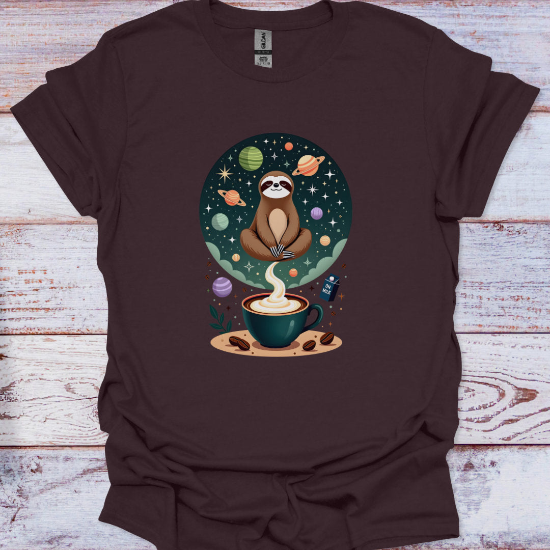 Brown t-shirt with a sloth and coffee design on a wooden surface