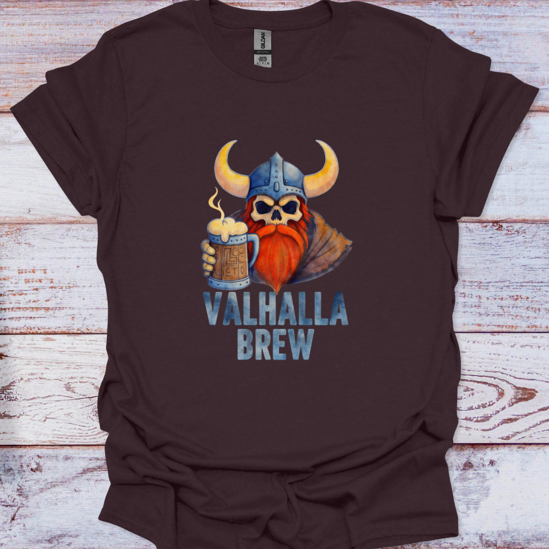 Brown t-shirt with a graphic of a Viking holding a mug labeled 'Valhalla Brew' on a wooden surface.